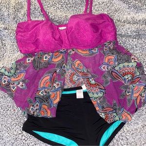 Pink floral tankini with black swim bottoms